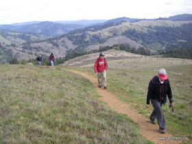 Hikers traverse a rarely accessible ridgetop on a previous Landpaths outing in the far west of Sonoma County.