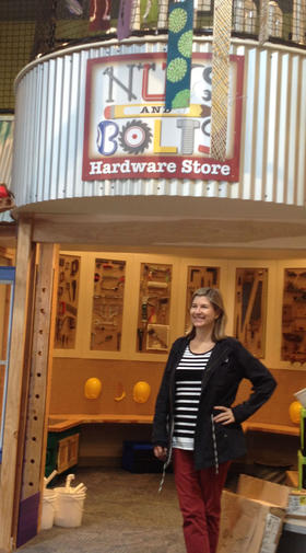 Colleen Michaud shows off the hardware store corner inside the new Children's Museum of Sonoma County, which officially opens its doors on Saturday.